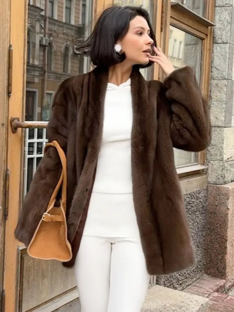 Veste Daniela ceinturée en fausse fourrure